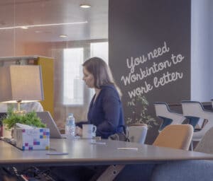 Woman working on Coworking Space Alfardan Centre