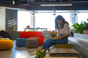 A woman working on her laptop